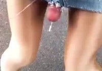 Shemale cums on the asphalt from sexual fantasy