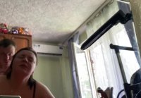 Russian husband Roasts his Wife Near the Mirror, filming on a new iPhone