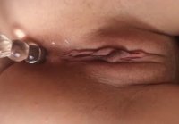 Fucks wife in the anus with glass dildo