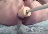 A sex machine fucking a shitty lady in the asshole and she pissed herself