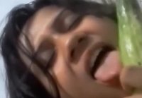 Girl fucking herself with zucchini