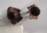 Chick massages and wanks African cock