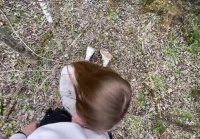 A young girl worked her mouth in the forest in fresh air