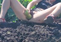 Masturbation with zucchini in field