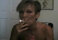 Blonde with Short Hair Sucks Cigarette