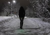 She walks with " LANTERN" in her ass on winter street