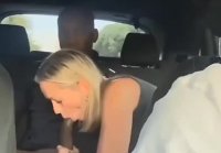 Wife sucks black man in the back seat