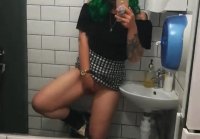 Naughty amateur girl masturbates in a public toilet