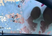 Chick rubs her juicy ass against soapy car glass