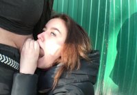 In the park by the river gives a guy blowjob