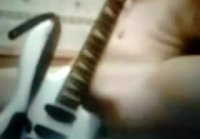 Jerking off with a guitar