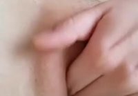 Playful fingers caress shaved pussy