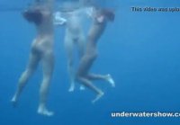 Lesbians swimming in the pool