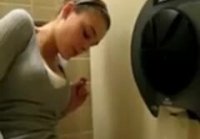 Female handjob in the toilet