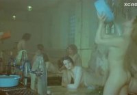 Lesbian washes and caresses her friend in a public bath