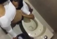 Cunnilingus in the nightclub toilet from her friend