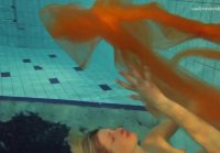 Exquisite underwater show with slender Nastya waving flax