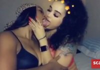 Black lesbians kiss passionately