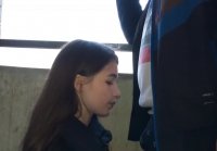 Young sucks and takes cum in her mouth on balcony